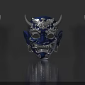 Intricate Blue Mask With Silver Horns Fangs Earrings And Decorative Patterns
