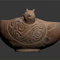 Reddish Brown Terracotta Bowl With Animal Head Decoration And Carved Patterns