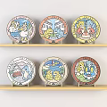 Set Of Colorful Decorative Plates With Cartoon Characters On Wooden Shelves