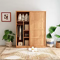 Wooden Sliding Door Wardrobe With Hanging Clothes Storage Baskets Indoor Green Plants And Decorative Painting
