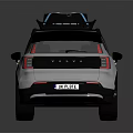 White Modern Car With Black Roof Rack And Blue Accented Wheels