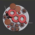Assorted Sweet Desserts with Pink Donuts Mini Cakes Chocolate Bars and Cherries on White Plate