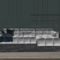 White Sectional Sofa with Blue Throw and Pillows in Dark Wall Living Room with Shelves
