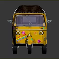 Yellow Tuk Tuk With Brown Canopy Colorful Decorations And Green Lights