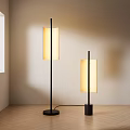 Two Modern Floor Lamps With Black Poles And Rectangular Warm Light Shades In Minimalist Room