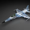 Blue And White Camouflage Fighter Jet With Transparent Cockpit Pointed Nose And Wing Emblems