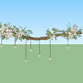 Rustic Branch Chandelier With Pink And White Flowers And Small Hanging Bulbs