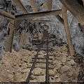 Mine Tunnel Interior With Rail Tracks Wooden Supports Rocky Ground And Dirt Floor
