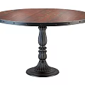 Round Wooden Dining Table With Carved Black Pedestal Base And Classic Design