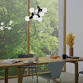 Cozy Restaurant Dining Area With Wooden Table Setting Large Windows Green Trees Outside And Chandelier