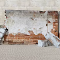 Weathered Building Exterior Wall With Peeling White Paint Exposed Red Bricks And Stone Blocks