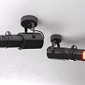 Black Spotlights With Blue And Red Light Mounted On White Wall Interior