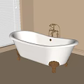 Elegant Freestanding White Bathtub With Gold Feet And Faucet In Minimalist Bathroom
