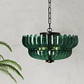 Stylish Green Glass Pendant Lights Featuring Petal Shaped And Ribbed Shades Hanging From Metal Chains