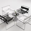 Modern Leisure Chairs With Black White Seats And Metal Frames Around Small Table