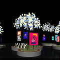 Illuminated Tree Like Decorations On Circular Bases With Colorful City Billboards