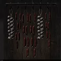 Traditional Hanging Food Storage With Sausages And Garlic Bulbs On Wooden Board