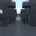 Symmetrical Gray Stone Pillars Art Installation With Person Interacting In Modern Gallery Space