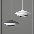 Modern Layered Pendant Lights In Black And White Hanging On Gray Wall