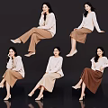 Multiple Women In Different Sitting Poses With Beige Tops And Colored Skirts