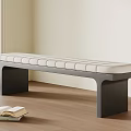 Stylish Padded Bench With Dark Legs In Bright Room With Wooden Floor And Open Book