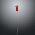 Ornate Golden Scepter with Red and Black Decorative Top and Red Gemstone Base