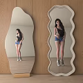 Two Irregular Shape Standing Mirrors with Artistic Design Against Wooden Wall
