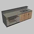 Modern Kitchen Counter With Gray Top Wooden Cabinets Sink And Open Grill Rack