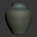 Textured Ceramic Vase With Greenish Body And Blue Drip Glaze Finish