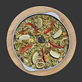 Delicious Seafood Rice with Lemon Slices Red Chilies Squid Rings in Stoneware Pot