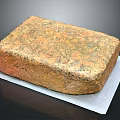 Natural Stone Block Featuring Rustic Brown Green Surface Texture On White Pad 3d model