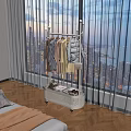Stylish Clothes Hanging On Portable Rack With Storage Basket By Window City View