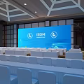 Modern Event Stage With Large Screen IDEM Logo And Purple Audience Seats