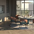 Modern Restaurant Interior With Round Dining Table Orange Blue Chairs Large Windows And Herringbone Flooring