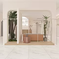 Modern Minimalist Clothing Store Interior With Mannequins Clothing Displays Plants And Arch Design
