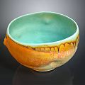 Carved Ceramic Bowl Sculpture With Orange Green Glazed Surface And Textured Design