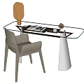 Modern Glass Top Desk With Beige Chair Open Book And Golden Table Lamp