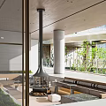 Modern Living Room Interior With Black Chimney Fireplace Seating And Courtyard View