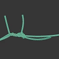 Beige Twisted Rope Knot Displayed On Dark Smooth Surface With Subtle Reflection