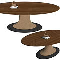 Modern Oval Dining Tables With Glass Top And Golden Metallic Black Base Featuring Decorative Items