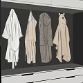 Soft White And Light Gray Robes Hanging In Modern Wardrobe With LED Lights And Drawers