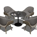 Modern Round Black Table with Four Gray Chairs Wooden Legs and Small Plant Set