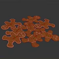 Freshly Baked Gingerbread Men Cookies Orange with White Icing Edges and Green Decorations