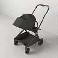 Sleek Black Baby Stroller With Brown Handle And Modern Wheel Design