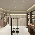 Modern Clothing Store with Window Display and Mannequins Showcasing Fashion Outfits and Interior Design