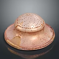 Light Brown Ceramic Sculpture With Dome Shaped Top Small Holes And Worn Base Plate