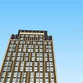 Modern High Rise Office Building With Glass Facade And Multiple Floors Design