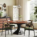 Vintage Round Dining Table Set With Floral Upholstered Chairs For Cozy Bright Home Dining Space