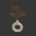 White Vase With Circular Hole Holding Green Branches In Simple Decor