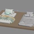 Two Beds With Green And White Bedding Pillows And Blankets On Wooden Platform